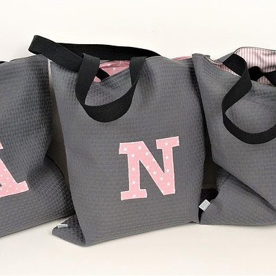 Bolsa shopping reversible con inicial