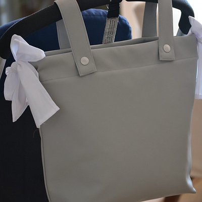 Bolsa panera para cochecito en polipiel