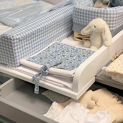 Adaptador de cambiador para cómoda ajustable