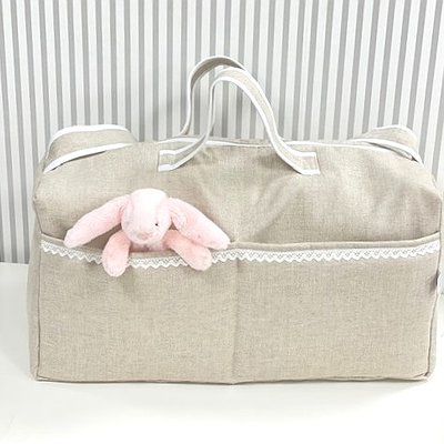 Bolsa clínica de tela con puntilla bolillo