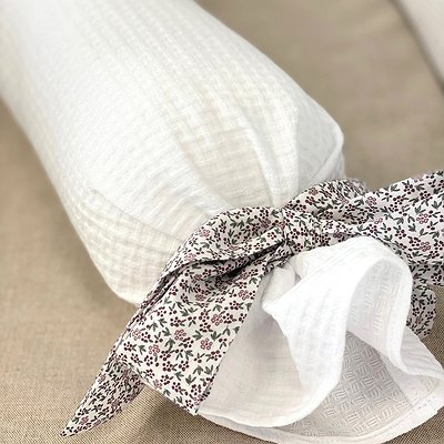 Cojín antivuelco con lazos