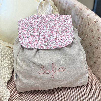 Mochila guardería de tela con nombre bordado a máquina